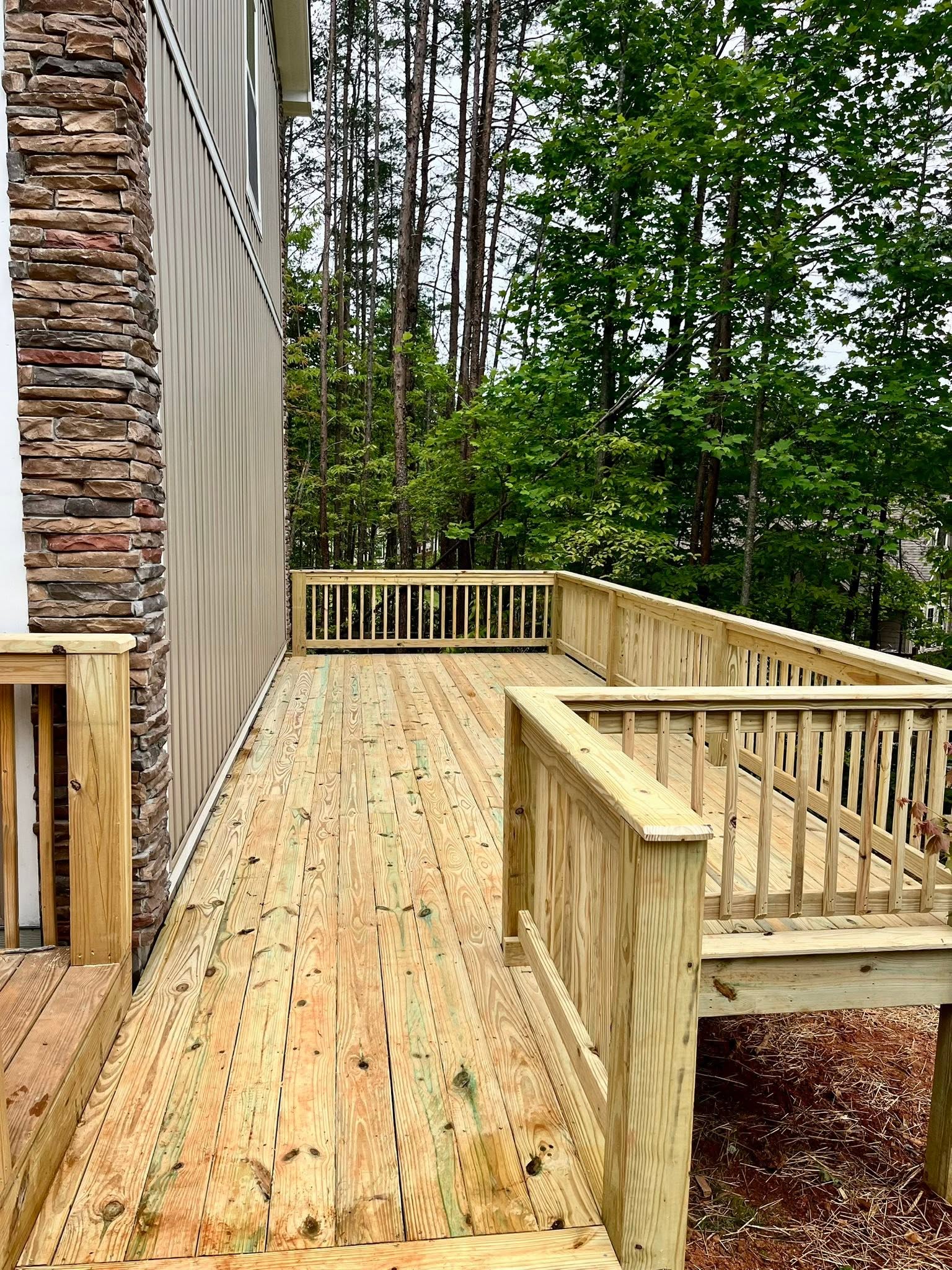 Outdoor deck building and railing install for a Union County home Outdoor deck building and railing install for a Union County home